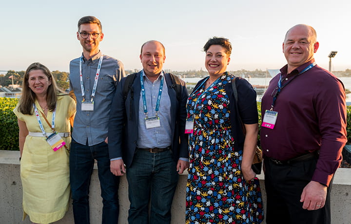 Five SOT Annual Meeting attendees pose together outdoors. 