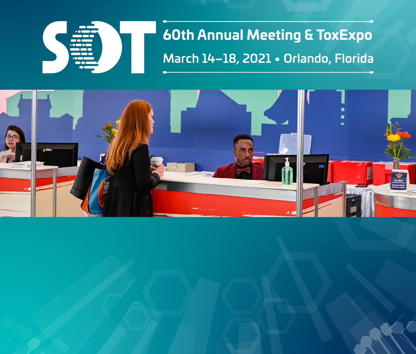 A blurred lab technician inspecting a petri dish.